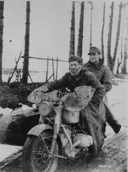 Elements of a Waffen SS reconnaissance company move through the Ardennes.