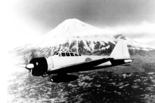 A Mitsubishi A6M Zero over Mt. Fuji. The Zero proved a deadly adversary to the Americans piloting the P-39's and P-400's in defense of Port Moresby.