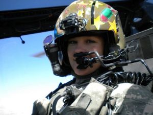 Cass in her Apache's cockpit. See Part I of Gwenie's story for how we met in Afghanistan, and how Cass and her fellow pilot, CW5 Reagan, saved a lot of lives (including my own) over Ajerestan in September 2010.