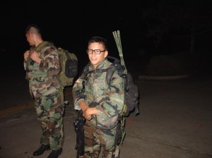 Stiney on a night patrol, carrying the platoon's commo gear.